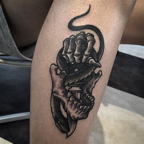 Different leg bracers blackwork tattoo. Dagger Skeleton Snake tattoo on Leg | tats | Tatuaje de ...