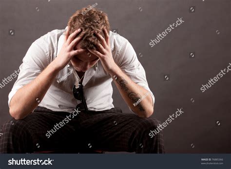 Young Man In A Gesture Of Despair Stock Photo 76885366 Shutterstock