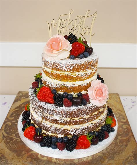 Two Tier Naked Wedding Cake With Toffee And Victoria Sponge Decorated With A Selection Of Mixed