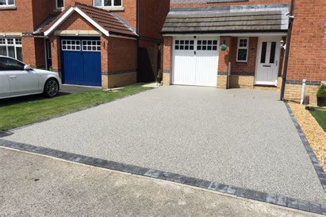 How much does an asphalt driveway cost per ton? New Driveway Costs 2020 - How Much Does a Driveway Cost?