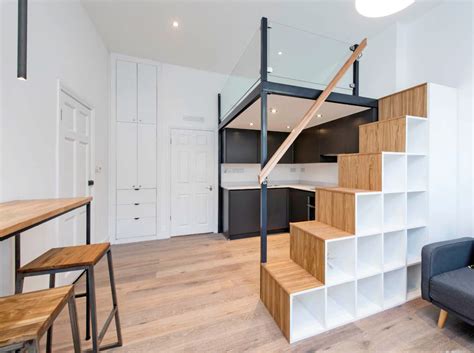 Staircase decor modern staircase home home stairs design stairway design house stairs design modern diy staircase house stairs. Contemporary mezzanine loft with stairs and storage ...