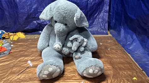 Destroy Huge Stuffed Animal Elephant Shredding With Serated Knife And