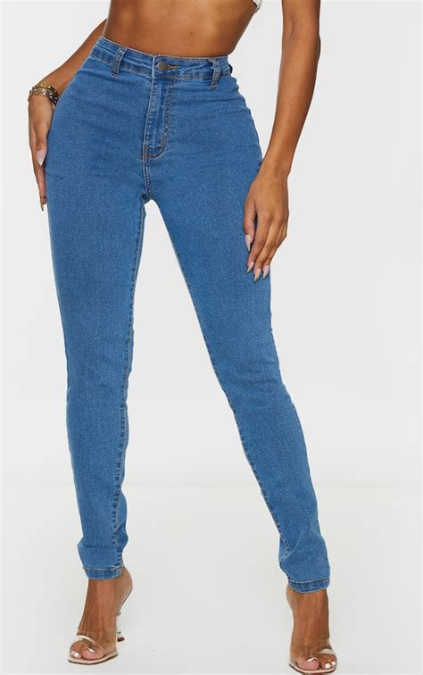 Shape Mid Blue Wash Disco Skinny Jeans Prettylittlething Usa