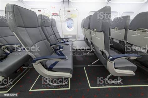 Inside View Of Emergency Exit Row In Commercial Passenger Aircraft