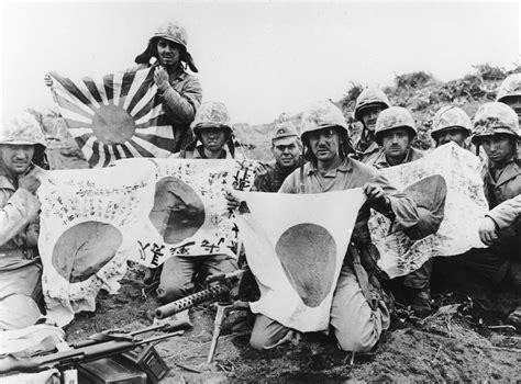 Us Marines Of The 5th Marine Division Pose With Captured Japanese
