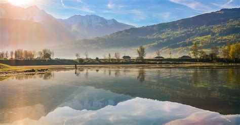 Mountains Reflection On The Placid Lake Surface · Free Stock Photo