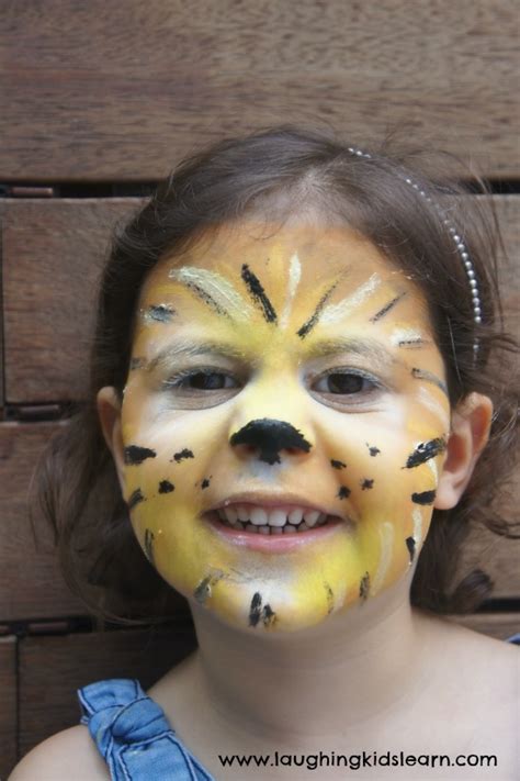 Simple Face Painting Design Of A Lion Laughing Kids Learn