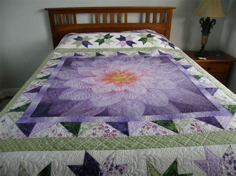 In some prints, the flowers are subdued and tiny, while others feature big, bold, vibrant flowers. Queen Quilt with Dream Big Panel | Panel quilt patterns ...