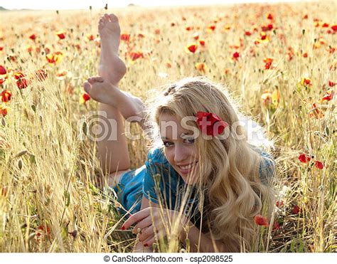 Barefoot Blonde In Poppies Beautiful Barefoot Blonde Lady Laying In Poppy Field CanStock