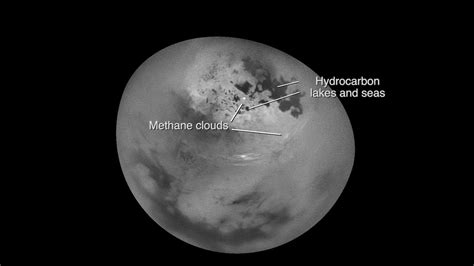 Saturns Moon Titan Moving Methane Clouds Captured By Spacecraft