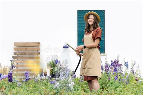 Young Woman Gardener Watering Garden Plants Stock Image Image Of Work