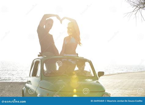 Couple At Sundown On The Beach With Car Stock Image Image Of Romance