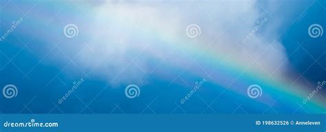 Rainbow In A Dreamy Blue Sky Spiritual And Nature Background Stock
