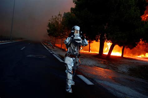 athens greece forest fires today multiple deaths reported latest updates cbs news