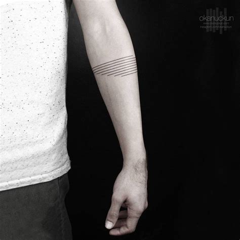 Minimalist Armband Tattoo On The Left Forearm