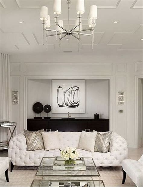 Elegant All White Living Room Decor With All Tufted Sofa And White