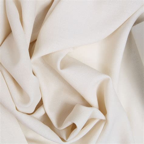 An Elegant Cream Wool Dress Crepe Fabric In 100 Wool