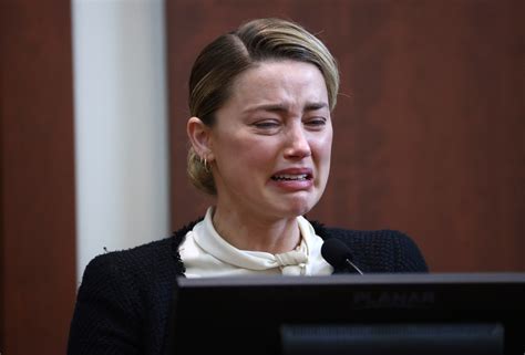 amber heard bursts into tears as she recalls alleged violation by johnny depp the independent