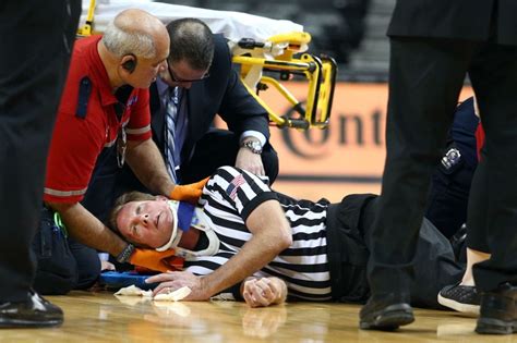 Basketball Referee Gets Knocked Out On Opening Tip Video