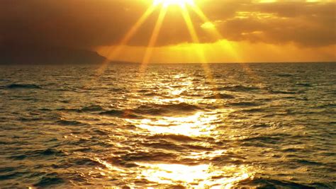Beautiful Sunset Over The Ocean With Sun Rays Stock Footage Video