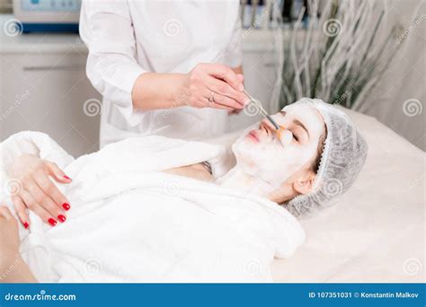 Young Pretty Woman Receiving Treatments In Beauty Salons Young