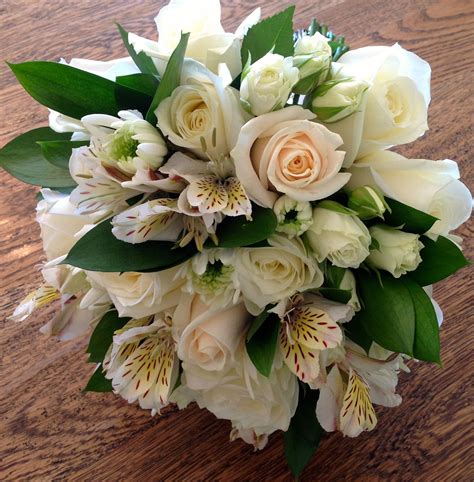 Creamed Toned Bridesmaid Bouquet With Roses Spray Roses Alstromeria And Emerald Ruscus Rose