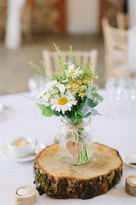 Fill the compote with clementines and garnish with fresh mint sprigs for a centerpiece that infuses the table with beautiful. Simple Wedding Flowers and Arrangements | Daisy wedding ...