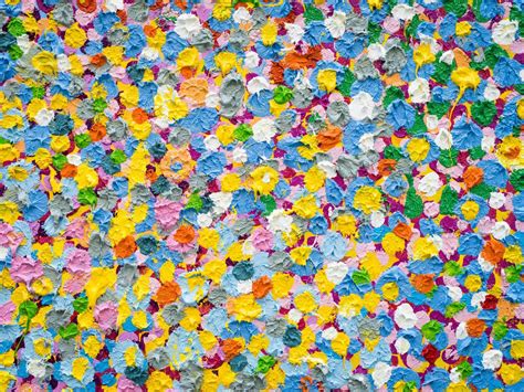 Damien Hirsts Latest Conceptual Feat Painting The Canvases Himself