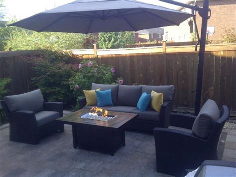perfect outdoor patio set with comfy chairs umbrella and fire pit cabanacoast® outdoor
