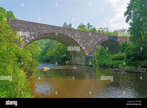 The Linville River Stone Arch Bridge Over a Quiet River in North
