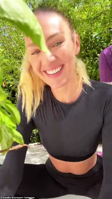 Candice Swanepoel Flaunts Abs In A Black Crop Top And Leggings As She