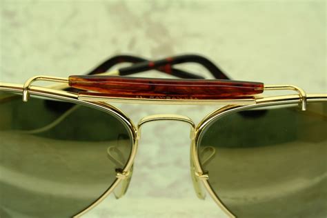 The sunglasses feature 24k gold. B&L RAY BAN Diamond hard aviator | Discount ray bans, Ray ...