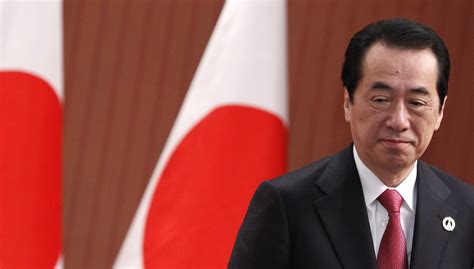 japan s prime minister survives no confidence vote but says he will resign