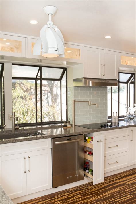 Their furniture is available in a wide range. White Shaker Cabinets in Bright & Airy Transitional Kitchen | HGTV
