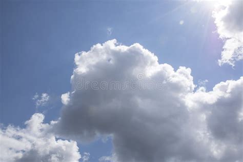 Cumulus Humilis Clouds In The Blue Sky View From Below Stock Photo