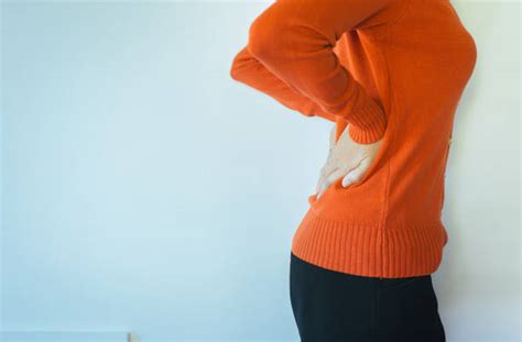 Asian Woman Back Pain Stock Photos Pictures And Royalty Free Images Istock