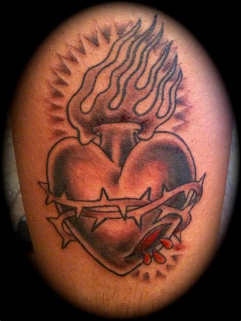 Simple Black And Grey Sacred Heart Tattoo On A Clients Leg Heart