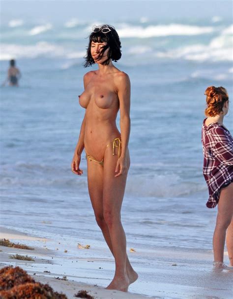 Milo Moiré Ditches Her Bikini To Display Her Amazing Talents While On The Beach In Mexico 21