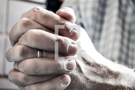 Mans Praying Hands — Photo — Lightstock