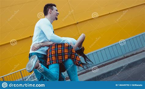 Young Smiling Couple In Love Man Holding Attractive Woman Hand Stock