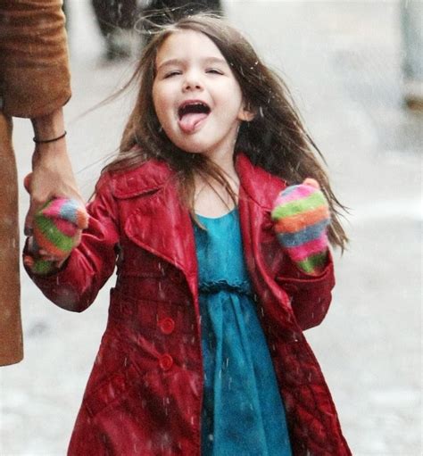 Suri Cruise Seen Enjoying The Snow As She Walks With Her Mom On