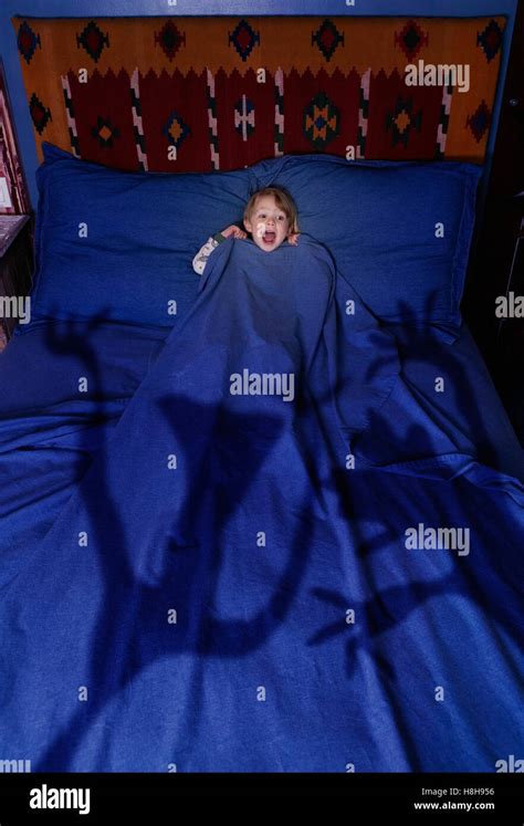 Young Boy Having A Nightmare Stock Photo Alamy
