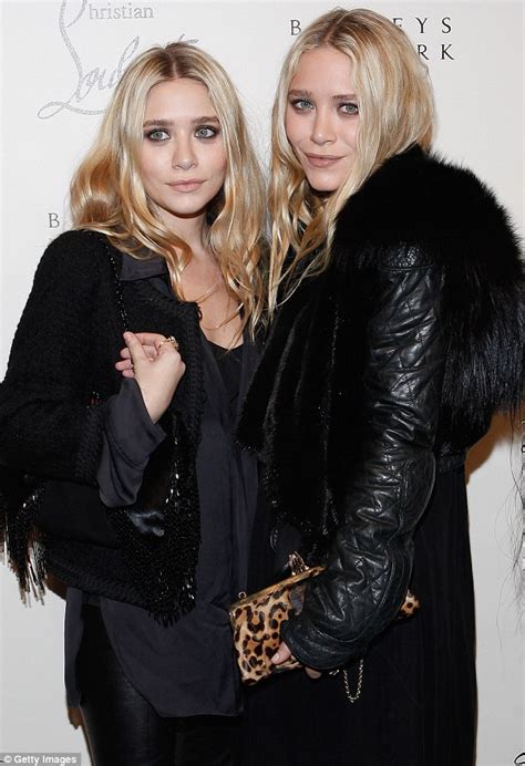 Ashley And Mary Kate Olsen Wear Matching Looks In Woolly Coats After