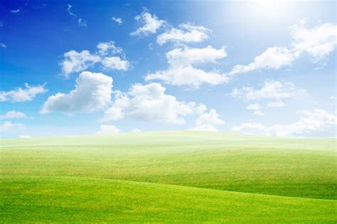 Premium Photo Green Land And Blue Sky