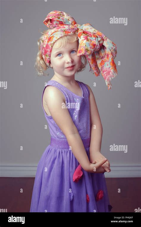 Portrait Of Cute Adorable White Blonde Caucasian Preschool Girl In