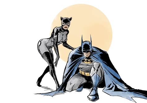 Batman And Catwoman Standing Next To Each Other