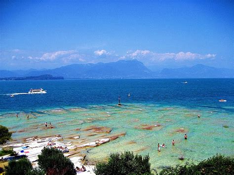 This is a very popular place. The best beaches on lake Garda | Gardasee urlaub, Gardasee ...