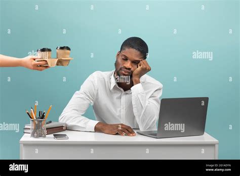 Exhausted Black Male Employee Needing Coffee Businessman Sleeping At