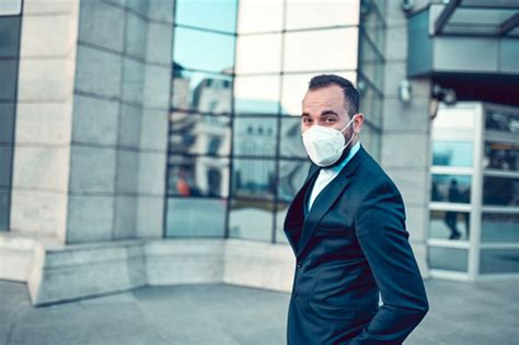 Modern Businessman With Face Mask Ready To Enter Office Building Stock