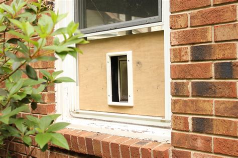 With the warmer weather arriving, i wanted to allow both the breezes and the cat to come in the windo… *The Handcrafted Life*: How To: Build a Custom Cat Door in a Window (Spring/Summer Edition)